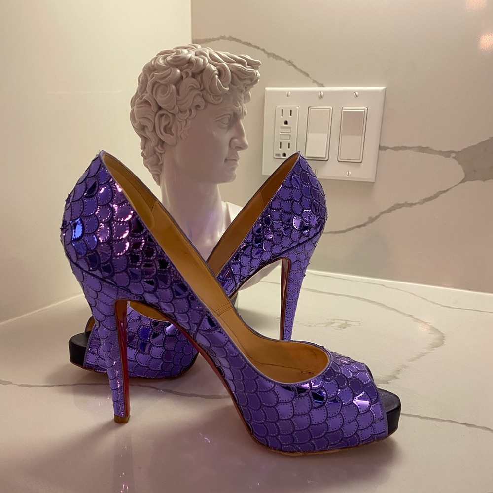 Christian Louboutin poseidon lavender heels.